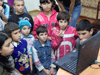 Children with poor eyesight watching educational film